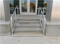 Fence Gallery Photo - Aluminum Stair Rail at Car Dealership.jpg